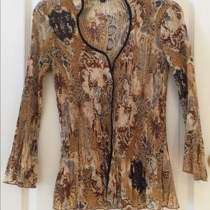 Pretty multi color blouse with nice design. Size S